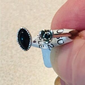 Urban Outfitters Silver Ring with Black Stone and Rose Design